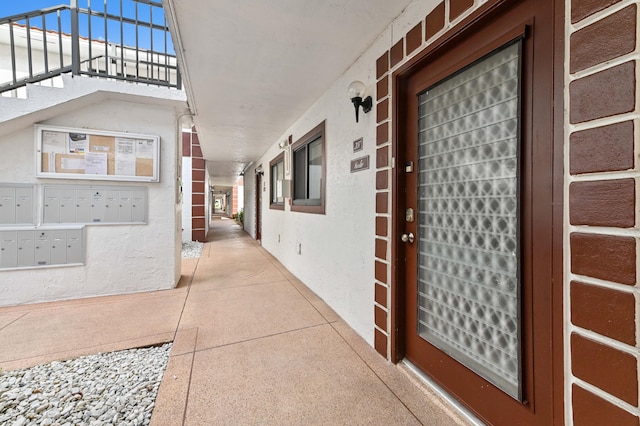 15451 Pembridge Dr Unit 207, Delray Beach, FL 33484 - entrance to property with stucco siding