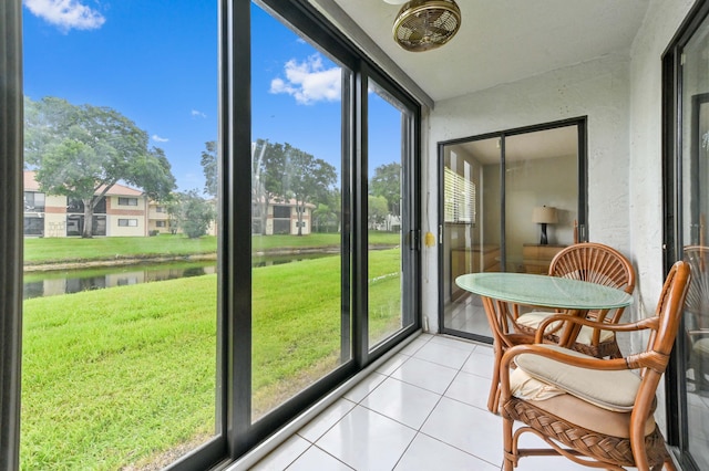15451 Pembridge Dr Unit 207, Delray Beach, FL 33484 - sunroom / solarium featuring a water view