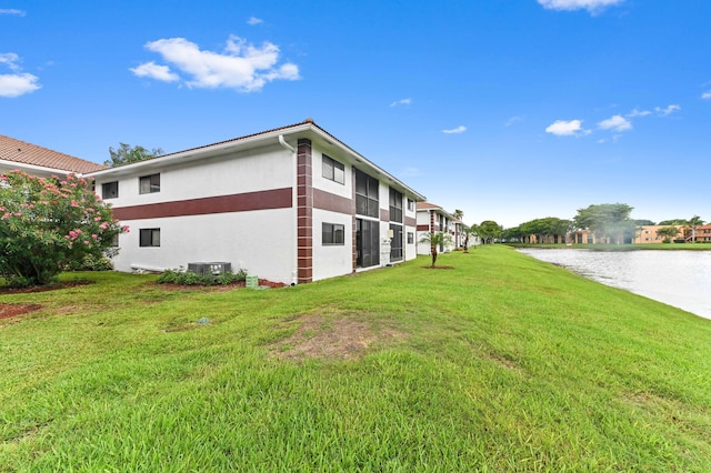 15451 Pembridge Dr Unit 207, Delray Beach, FL 33484 - view of grassy yard with a water view