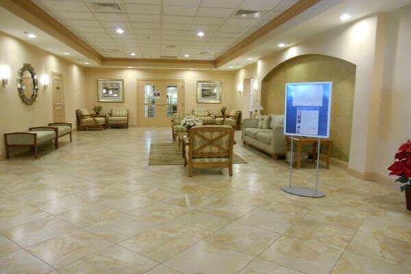 15451 Pembridge Dr Unit 207, Delray Beach, FL 33484 - building lobby with crown molding