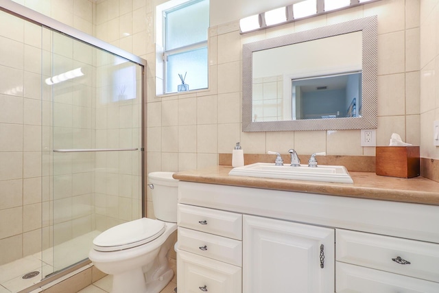15687 83rd Way N, Palm Beach Gardens, FL 33418 - bathroom with tile walls, vanity, a stall shower, and backsplash