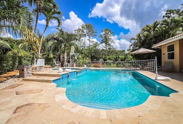 15687 83rd Way N, Palm Beach Gardens, FL 33418 - view of swimming pool with a patio and a pool with connected hot tub