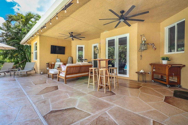 15687 83rd Way N, Palm Beach Gardens, FL 33418 - view of patio with ceiling fan and french doors