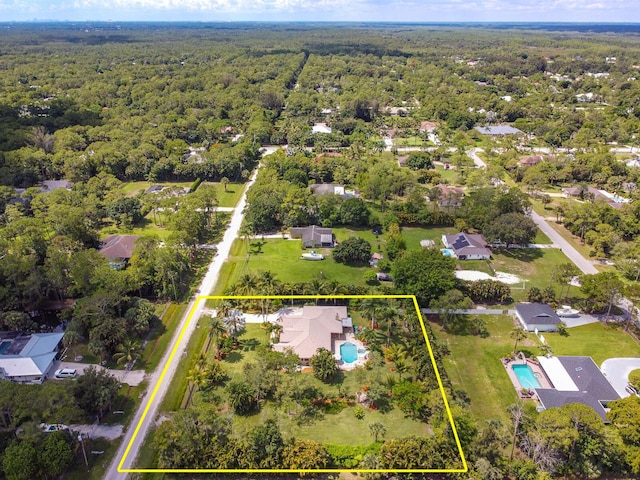 15687 83rd Way N, Palm Beach Gardens, FL 33418 - aerial view of property's location featuring a heavily wooded area and property boundaries highlighted