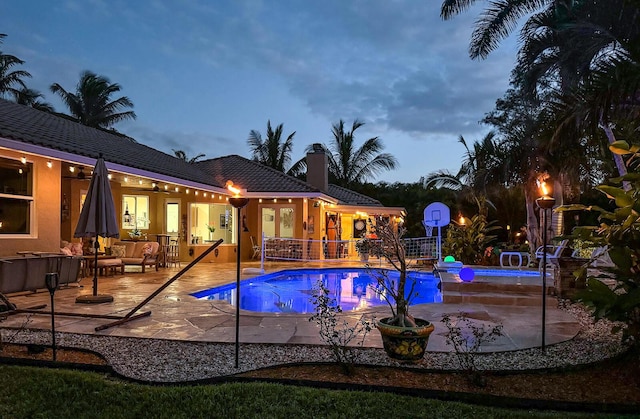 15687 83rd Way N, Palm Beach Gardens, FL 33418 - swimming pool featuring a jacuzzi, a patio area, and an outdoor hangout area