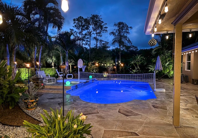 15687 83rd Way N, Palm Beach Gardens, FL 33418 - pool at twilight with a patio and an in-ground hot tub
