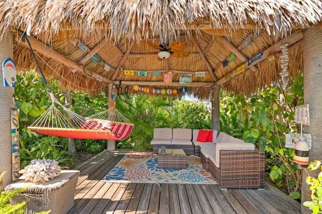 1501 SE 14th St, Deerfield Beach, FL 33441 - wooden terrace featuring a gazebo, ceiling fan, and an outdoor hangout area