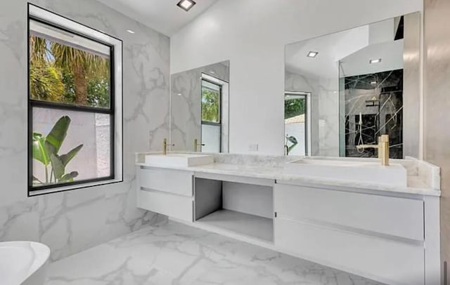 2299 NW 55th St, Boca Raton, FL 33496 - bathroom featuring marble tiled flooring, double vanity, a marble finish shower, and a freestanding tub