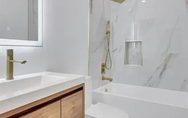 2299 NW 55th St, Boca Raton, FL 33496 - full bath featuring vanity and bathtub / shower combination