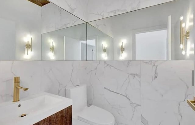 2299 NW 55th St, Boca Raton, FL 33496 - bathroom with vanity and tile walls