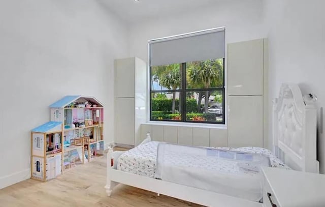 2299 NW 55th St, Boca Raton, FL 33496 - bedroom featuring wood finished floors