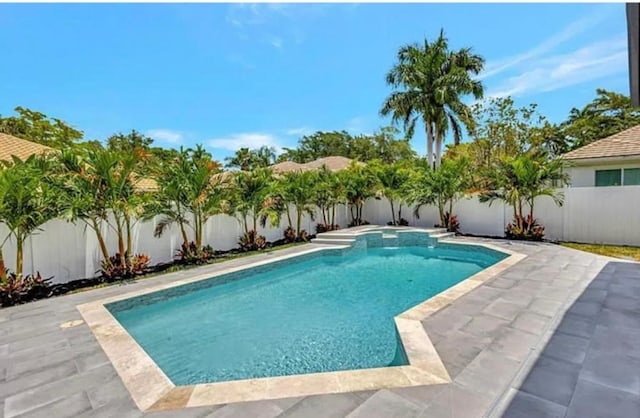 2299 NW 55th St, Boca Raton, FL 33496 - view of pool with a fenced backyard and a patio