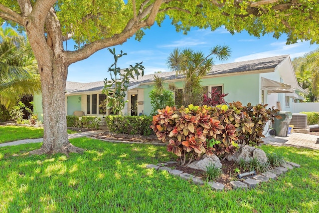 1098 SW 2nd St, Boca Raton, FL 33486 - ranch-style house with a front lawn and stucco siding