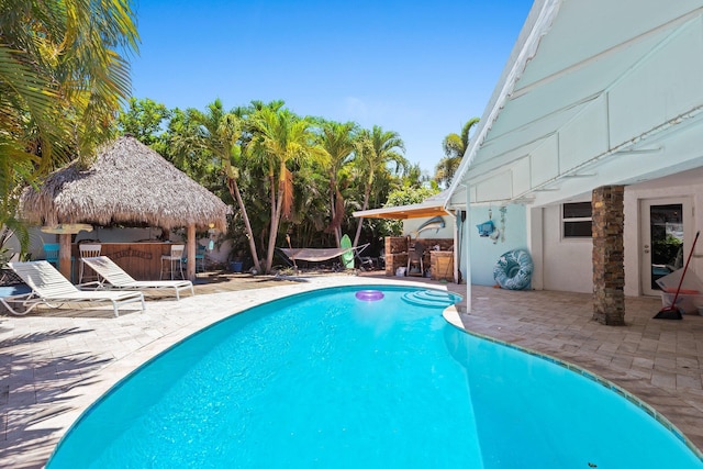 1098 SW 2nd St, Boca Raton, FL 33486 - view of swimming pool featuring a patio and a gazebo