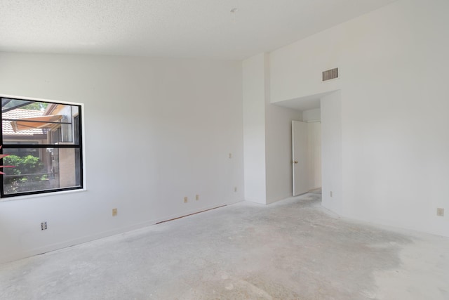 8057 Cassia Dr, Boynton Beach, FL 33472 - unfurnished room featuring concrete flooring