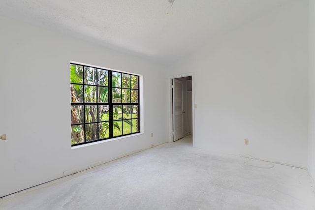 8057 Cassia Dr, Boynton Beach, FL 33472 - empty room featuring concrete flooring