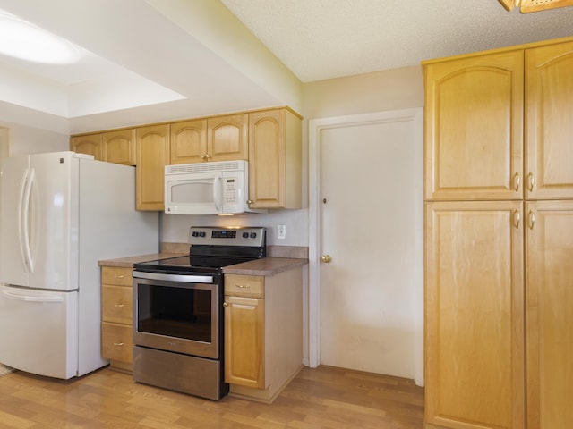 625 SW 21st Cir, Boynton Beach, FL 33426 - kitchen featuring white appliances, light brown cabinetry, and light wood-type flooring