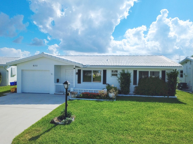 625 SW 21st Cir, Boynton Beach, FL 33426 - single story home featuring a tiled roof, driveway, an attached garage, and a front yard