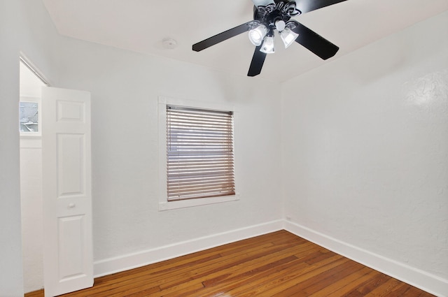 511 S K St, Lake Worth Beach, FL 33460 - spare room with ceiling fan, wood finished floors, and a smoke detector