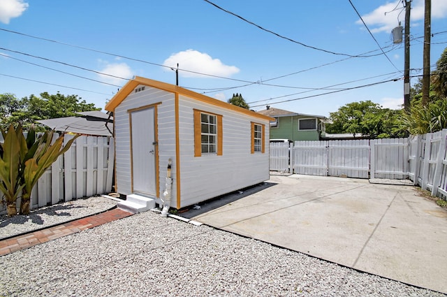 511 S K St, Lake Worth Beach, FL 33460 - view of shed featuring a fenced backyard and a gate