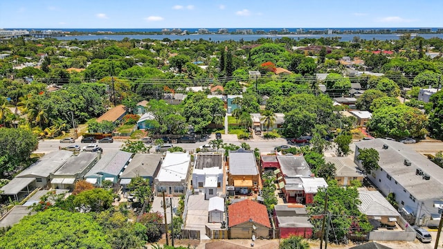 511 S K St, Lake Worth Beach, FL 33460 - aerial perspective of suburban area featuring a large body of water and a tree filled landscape
