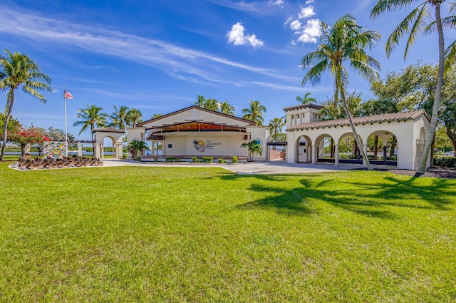 511 S K St, Lake Worth Beach, FL 33460 - back of house with a gazebo, a yard, and stucco siding