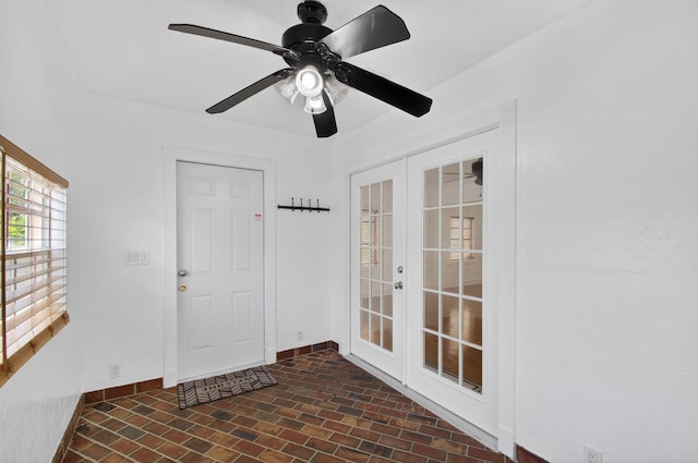 511 S K St, Lake Worth Beach, FL 33460 - foyer featuring brick patterned floors, french doors, and ceiling fan