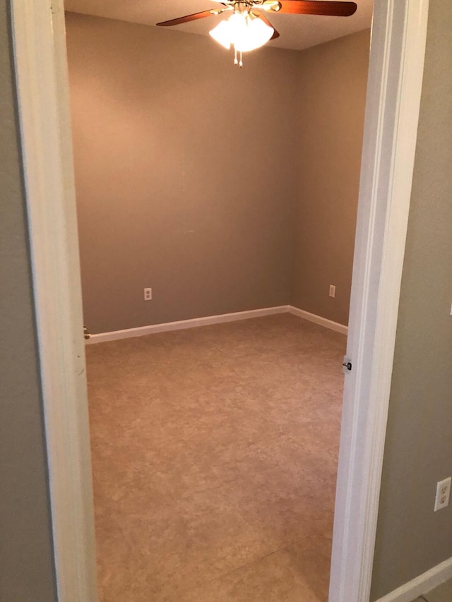 1991 Marsh Harbor Dr, Riviera Beach, FL 33404 - carpeted empty room with a ceiling fan and baseboards