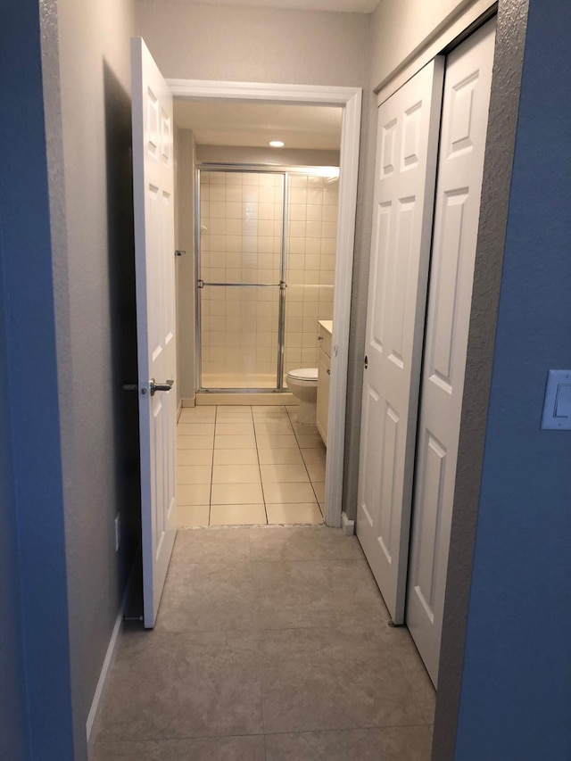 1991 Marsh Harbor Dr, Riviera Beach, FL 33404 - corridor featuring light tile patterned floors