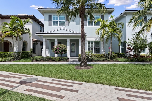 13313 Machiavelli Way, Palm Beach Gardens, FL 33418 - view of front of house with stucco siding and a front lawn