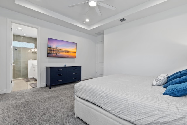 13313 Machiavelli Way, Palm Beach Gardens, FL 33418 - bedroom with carpet flooring, a chandelier, recessed lighting, a tray ceiling, and ensuite bath
