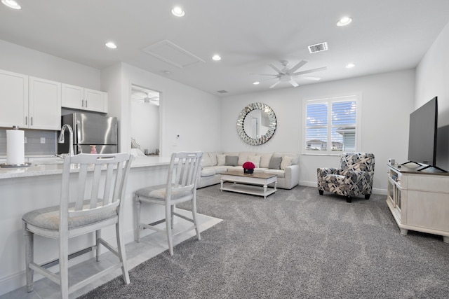 13313 Machiavelli Way, Palm Beach Gardens, FL 33418 - carpeted living area featuring ceiling fan and recessed lighting