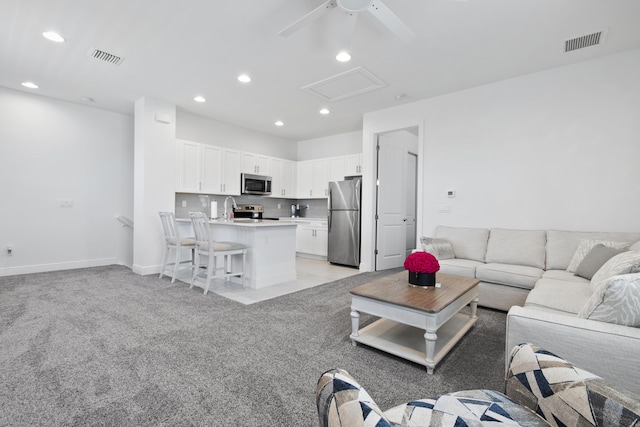13313 Machiavelli Way, Palm Beach Gardens, FL 33418 - living room with ceiling fan, recessed lighting, and light colored carpet