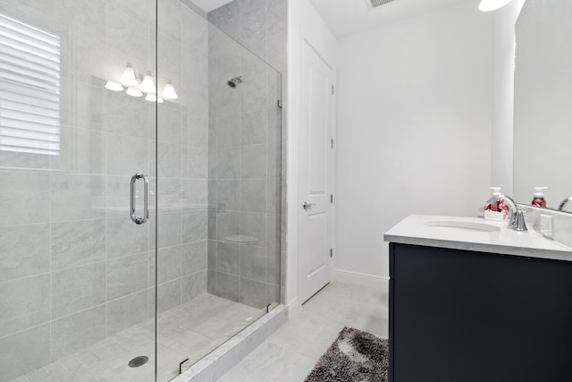 13313 Machiavelli Way, Palm Beach Gardens, FL 33418 - bathroom with a shower stall, vanity, and tile patterned floors