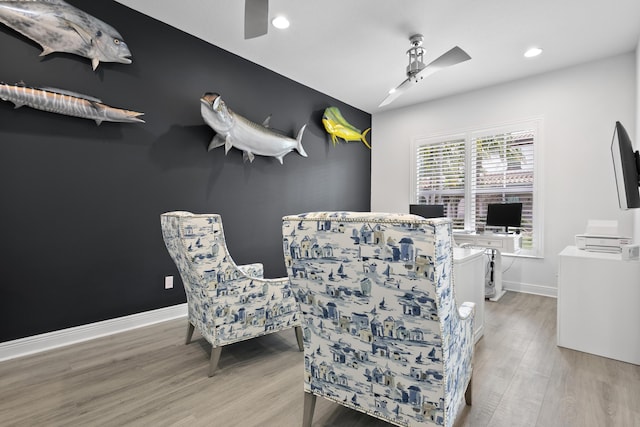 13313 Machiavelli Way, Palm Beach Gardens, FL 33418 - sitting room with ceiling fan, wood finished floors, and recessed lighting