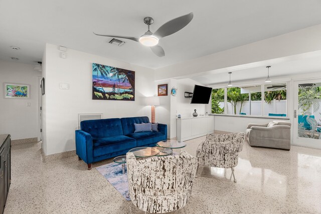 301 Linda Ln, West Palm Beach, FL 33405 - living area with a ceiling fan and speckle patterned floor