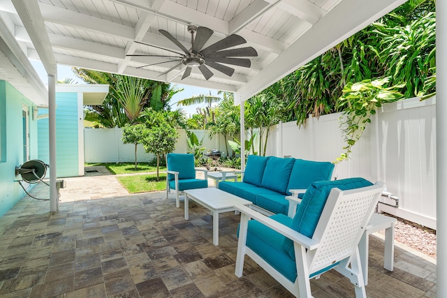 301 Linda Ln, West Palm Beach, FL 33405 - fenced backyard featuring an outdoor living space, a patio area, and a ceiling fan