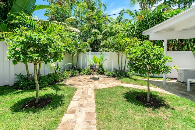 301 Linda Ln, West Palm Beach, FL 33405 - fenced backyard featuring a patio