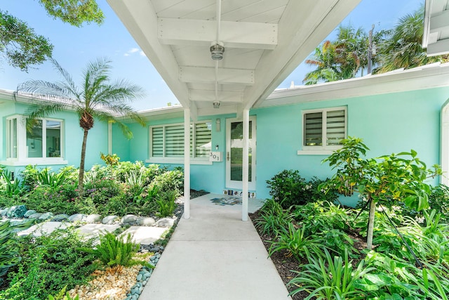 301 Linda Ln, West Palm Beach, FL 33405 - doorway to property featuring stucco siding