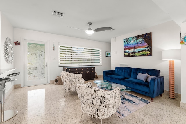 301 Linda Ln, West Palm Beach, FL 33405 - living area featuring speckled floor and ceiling fan