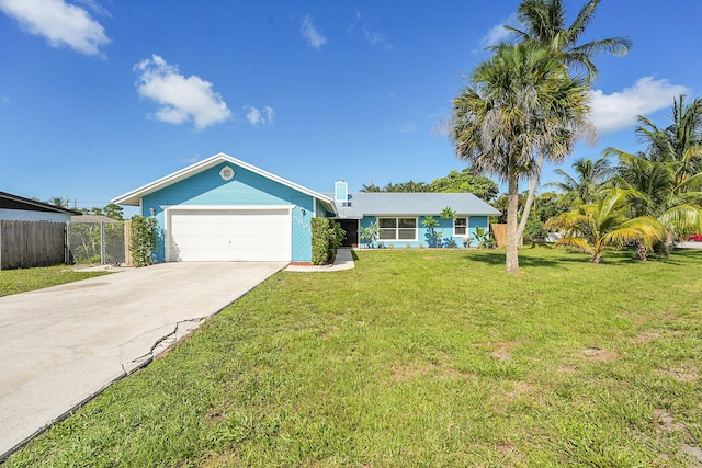 5801 SE Cable Dr, Stuart, FL 34997 - single story home featuring a garage and driveway