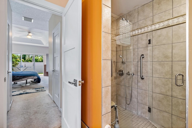 7727 Colony Lake Dr, Boynton Beach, FL 33436 - bathroom featuring a shower stall, ceiling fan, and a textured ceiling