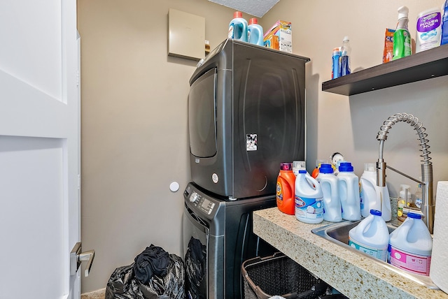 7727 Colony Lake Dr, Boynton Beach, FL 33436 - laundry area featuring stacked washer / dryer