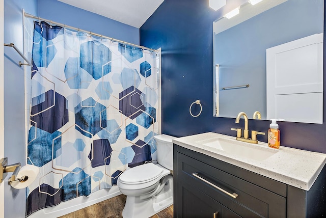 7727 Colony Lake Dr, Boynton Beach, FL 33436 - full bathroom featuring wood finished floors, vanity, and shower / bathtub combination with curtain