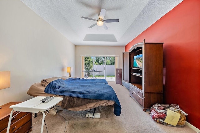 7727 Colony Lake Dr, Boynton Beach, FL 33436 - carpeted bedroom featuring a textured ceiling, access to exterior, and ceiling fan