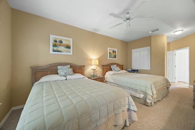 9894 Perfect Dr Unit 21, Port Saint Lucie, FL 34986 - bedroom featuring light colored carpet and ceiling fan