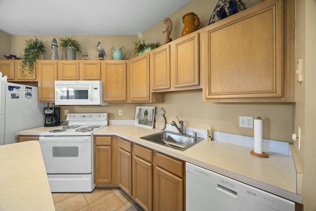 9894 Perfect Dr Unit 21, Port Saint Lucie, FL 34986 - kitchen featuring white appliances, light countertops, and light tile patterned floors
