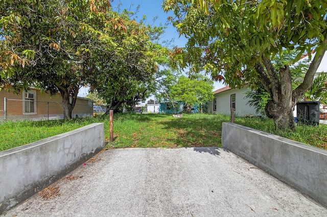 323 S E St, Lake Worth Beach, FL 33460 - view of yard featuring a patio area