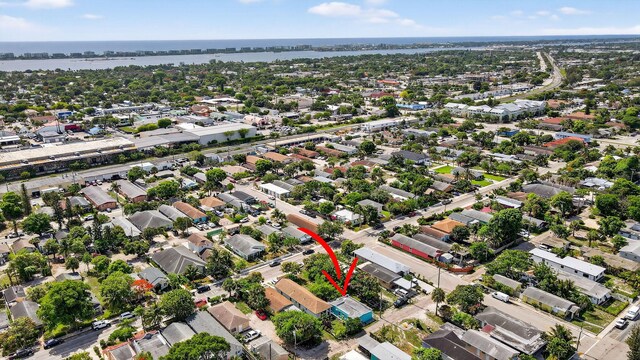 323 S E St, Lake Worth Beach, FL 33460 - aerial view of property and surrounding area with a large body of water and nearby suburban area