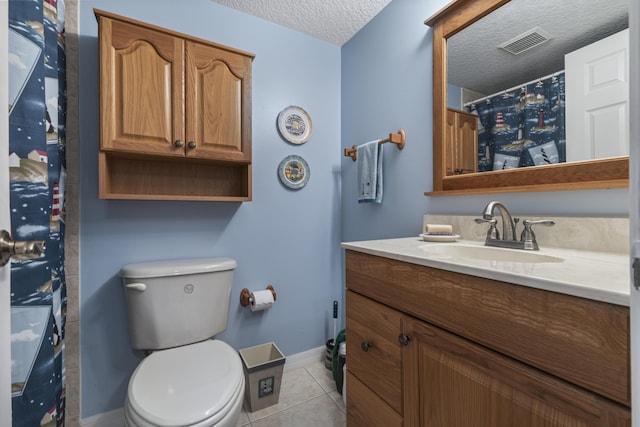 4215 Gator Trace Ave Unit I, Fort Pierce, FL 34950 - full bathroom featuring vanity, a textured ceiling, tile patterned floors, and a shower with curtain